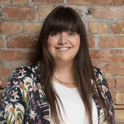 Headshot photograph of Daniella Bellaire, Head of Sales at Shopify Retail