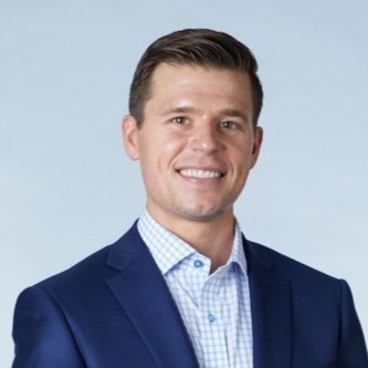 Headshot photograph of Kyle Coleman, Vice President of Revenue Growth and Enablement at Clari