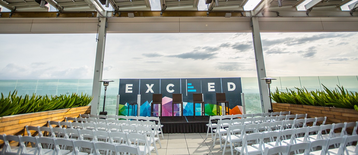 Photograph of seats lined up at EXCEED conference