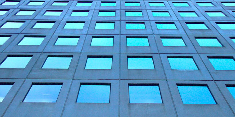 Photograph of a skyscraper's grid of windows