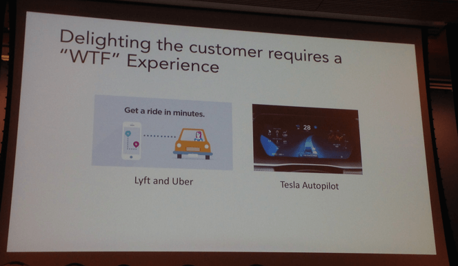 Photograph of a slide that says Delighting the customer requires a WTF experience