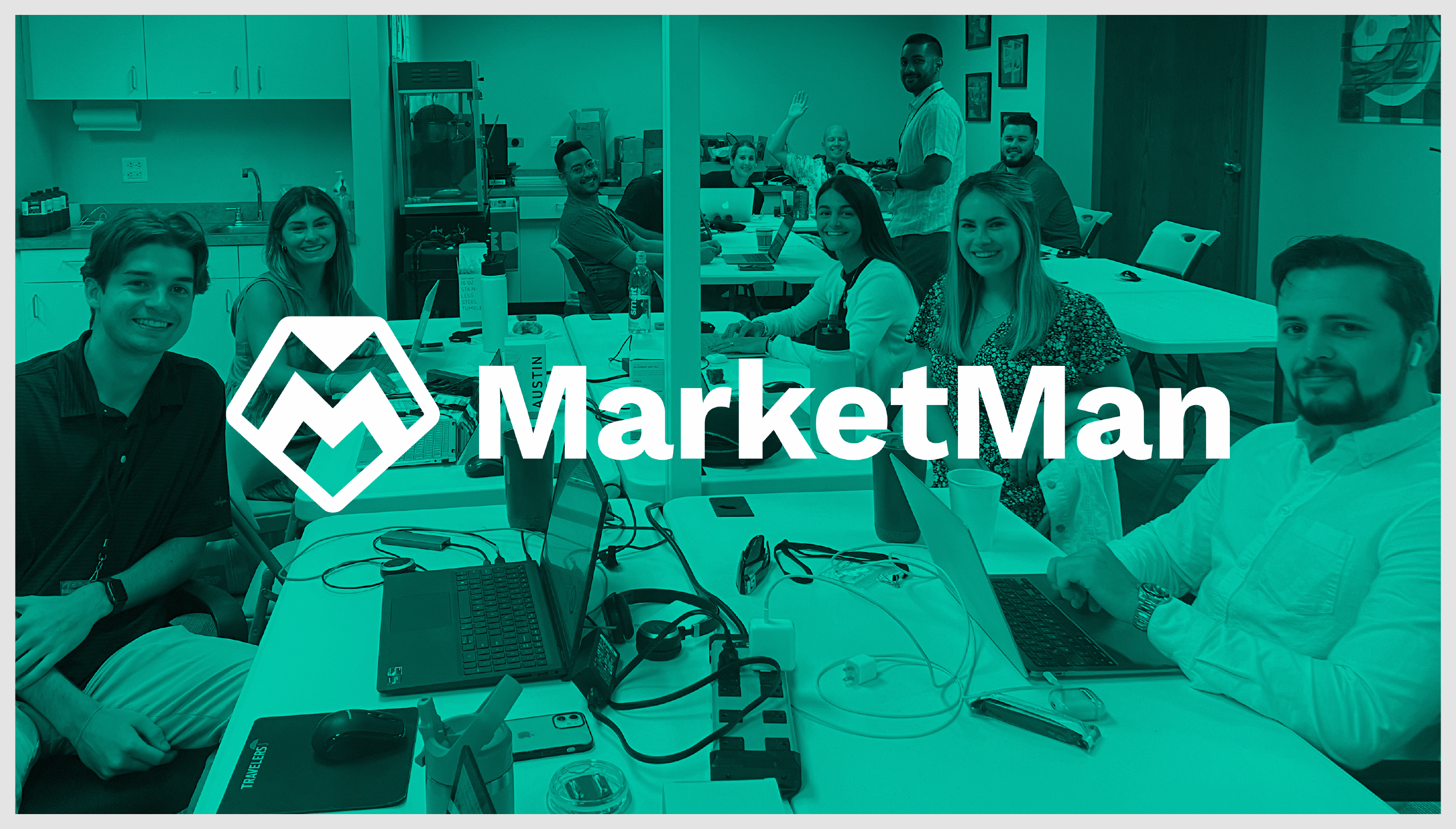 MarketMan logo overlapping a photograph of MarketMan employees working in the office