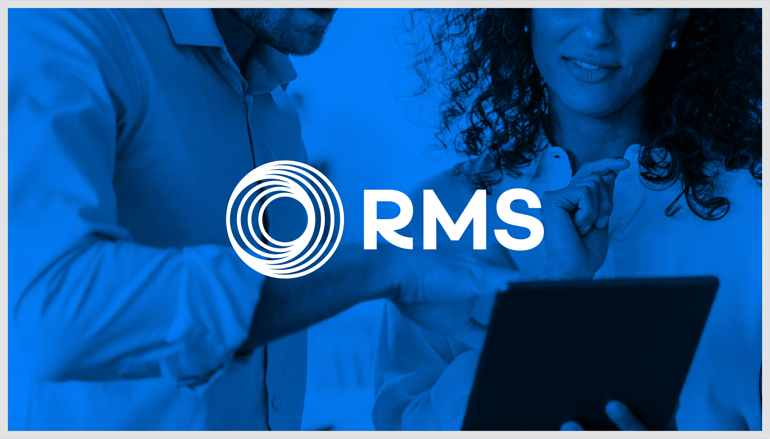 RMS logo over a photograph of two revenue leaders looking at a report on a tablet