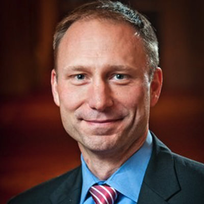 Headshot photograph of John Moore, VP of Sales at Kofax